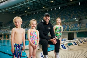 Kyle Chalmers with kids