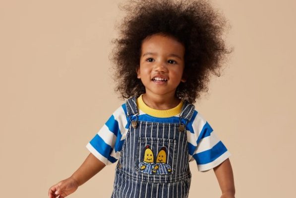 Boy wears Banana in Pyjamas overalls.