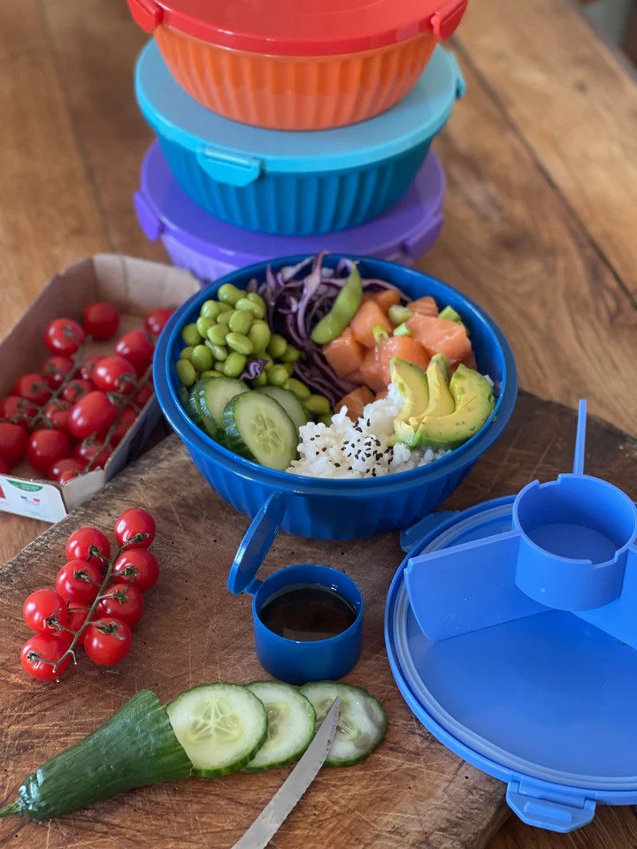 Poke bowl in a blue container.