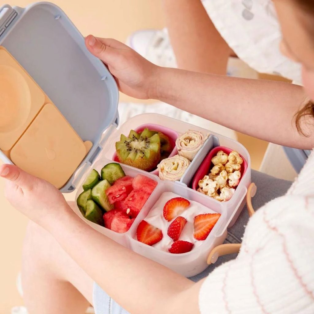 Lunch box filled with healthy snacks.