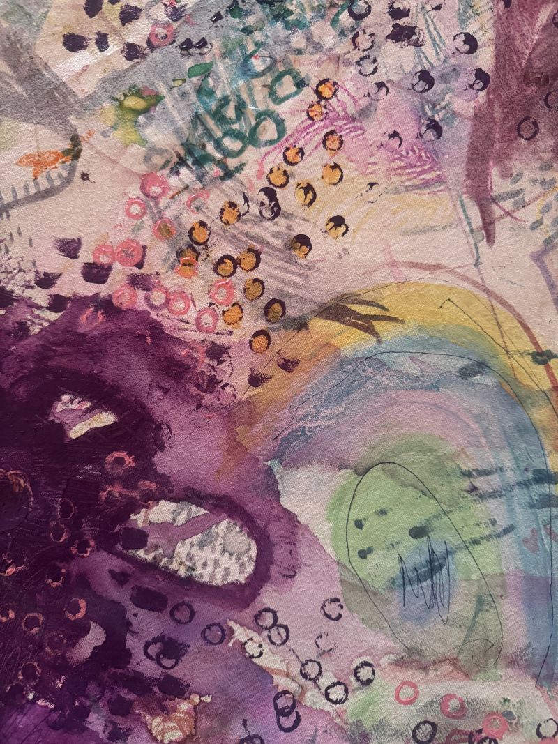 A vibrant painting featuring a rainbow arching over a butterfly amidst a colorful background.