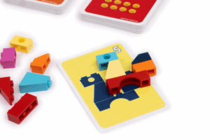 A vibrant assortment of building blocks and cards arranged together, showcasing various colors and shapes.