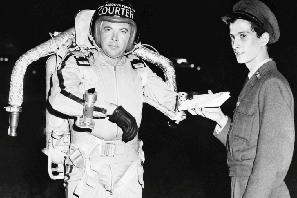 A man in a spacesuit stands holding a piece of paper, set against a backdrop of stars and space.