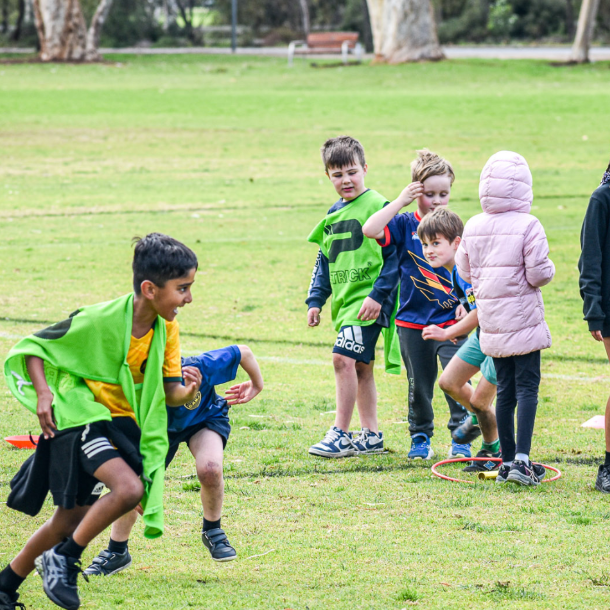 Children playing on a field.