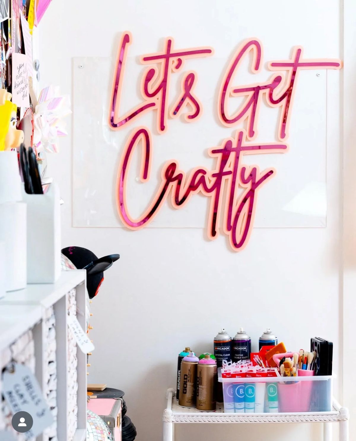 Neon sign displaying the phrase "Let's Get Crafty" in vibrant colors