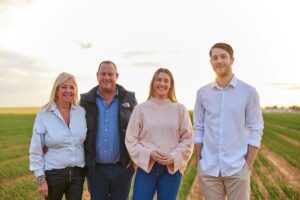 Spud Lite family smile at camera.