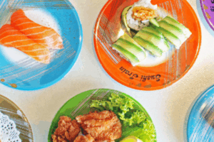 Sushi plates on a table.