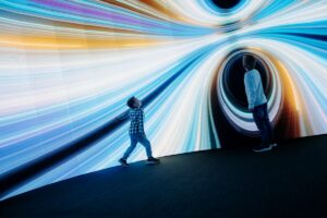 Kids play at Timelight light installation.
