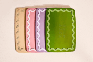Three colorful plastic chopping boards