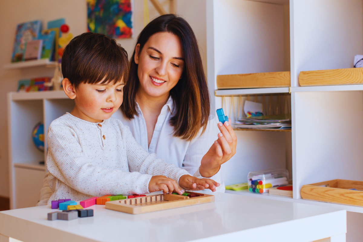 Mother playing with child.
