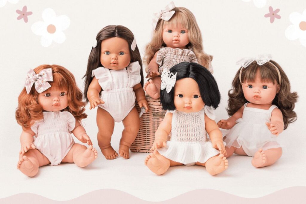 A diverse group of dolls featuring various hair colors and sizes, showcasing their unique styles and characteristics.