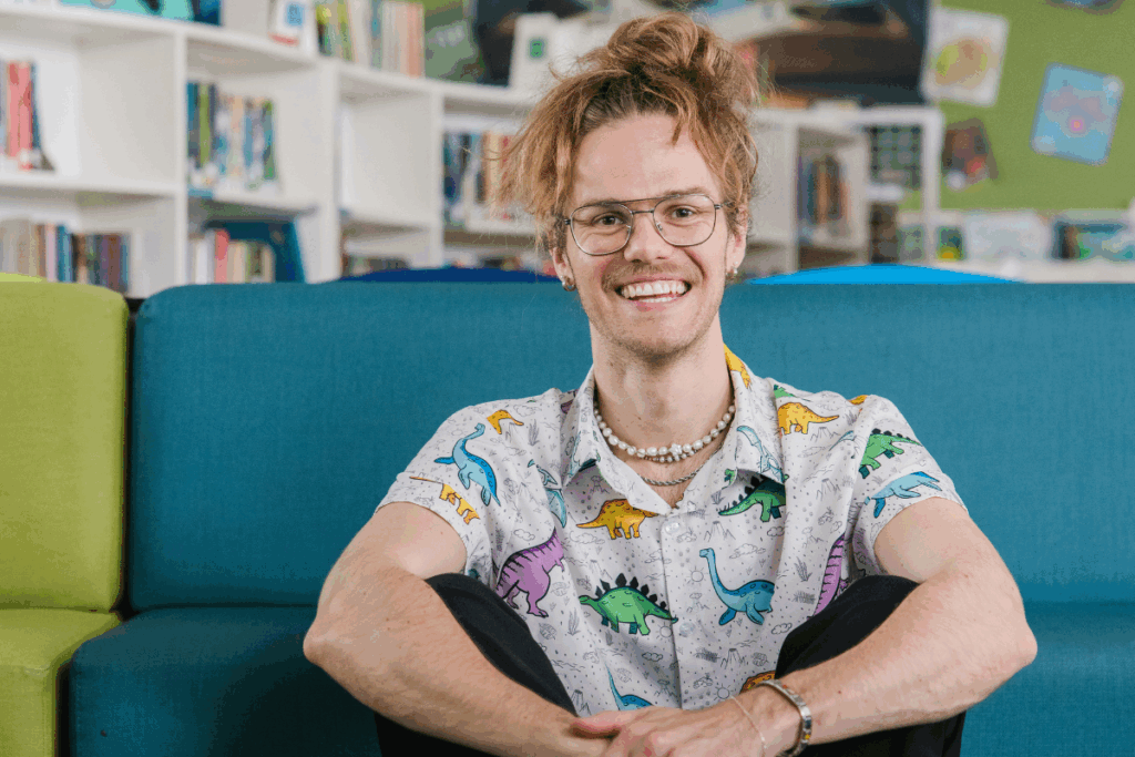 Mr Luke smiles at camera.