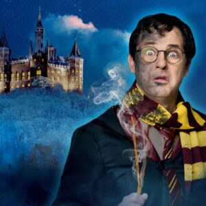 A magician dressed as Harry Potter with a want and moonlit mystical background.
