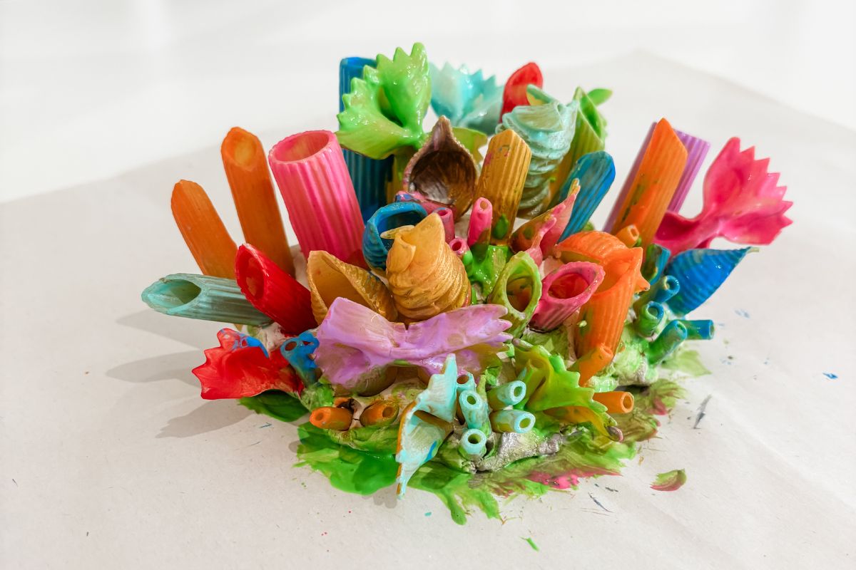 A vibrant collection of pasta tubes and sticks arranged in an artistic display.