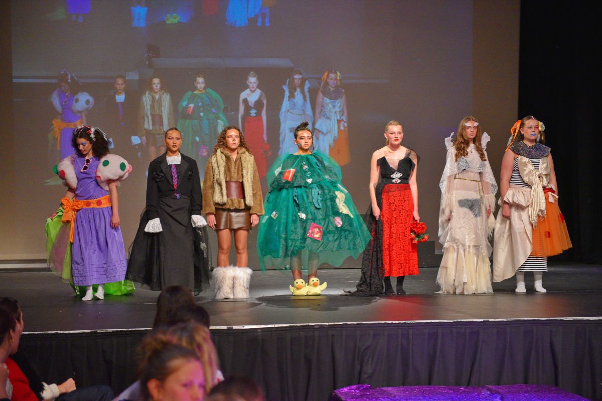 Seymour College Adelaide Students on stage dressed in costume for a performance.