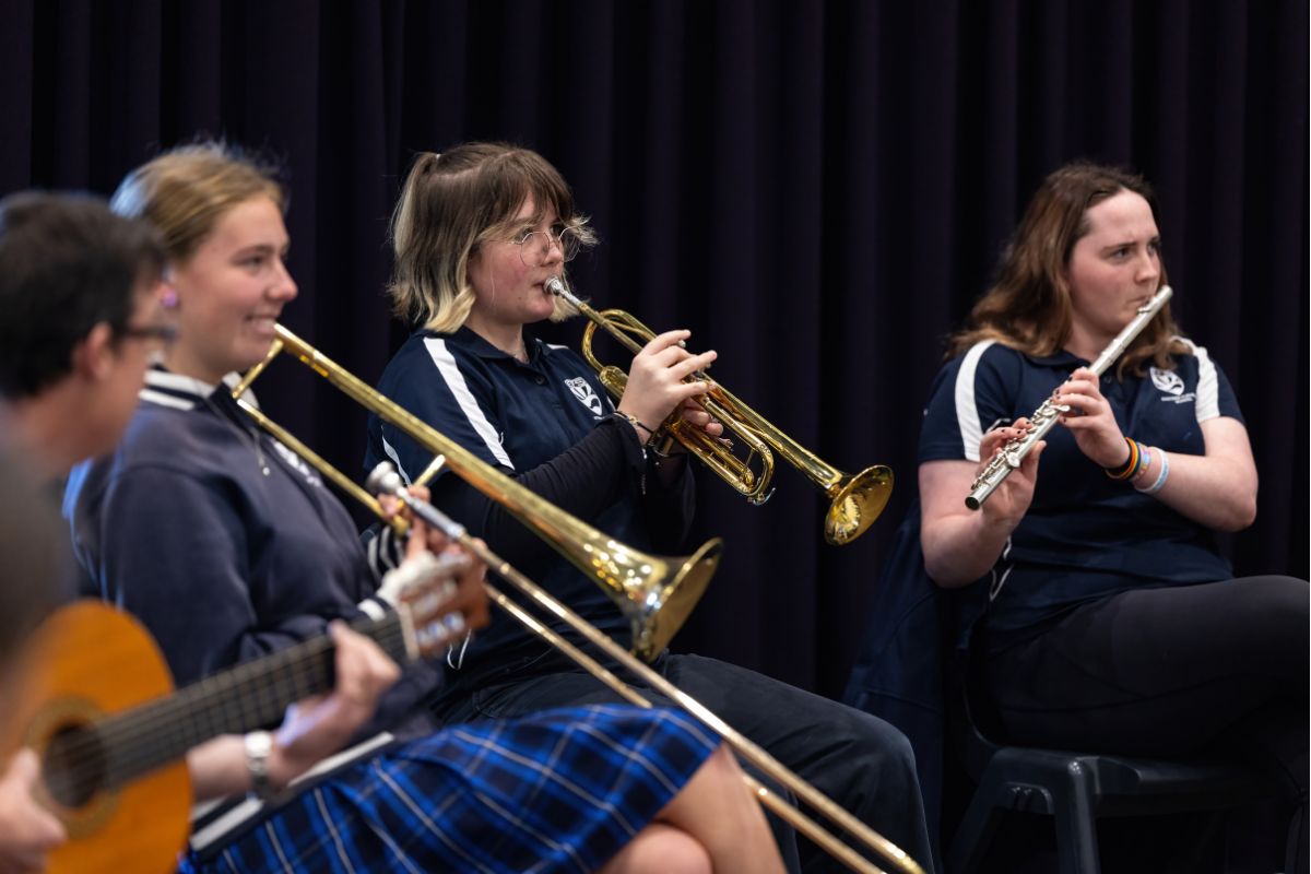 The ASO school Adelaide, students practice with their instrunments. 