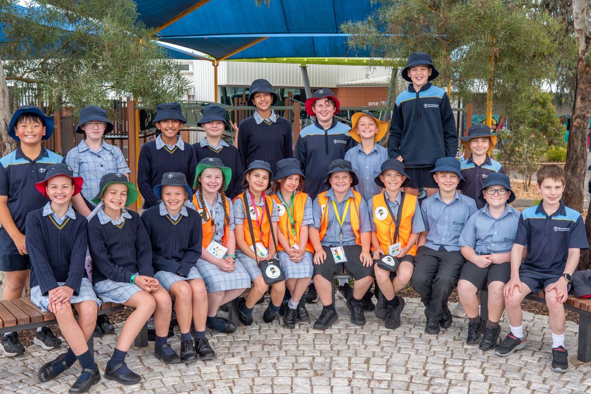 Good Shepherd School Adelaide students pose for a class photo outside. 