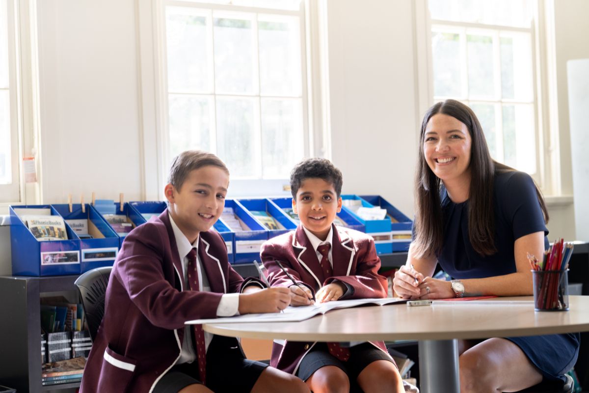 Prince Alfred College Adelaide students enjoy learning with their teacher. 