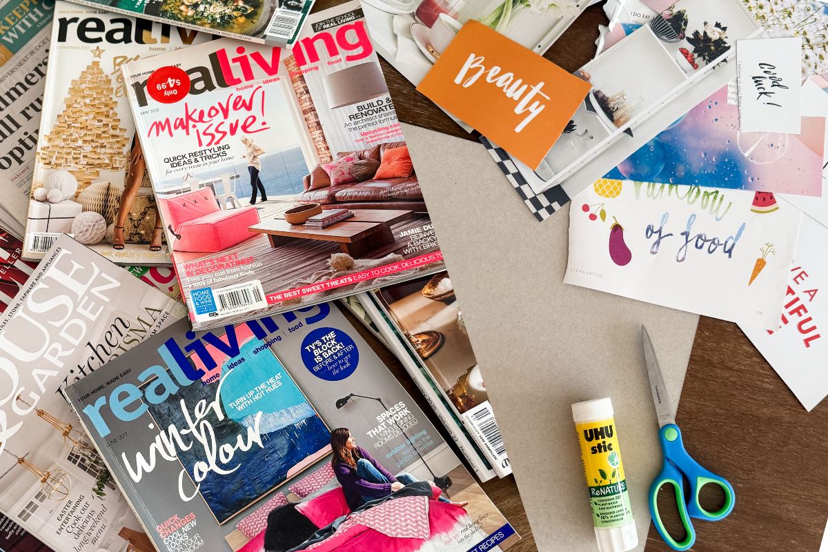 Magazines and craft supplies for junk journaling.