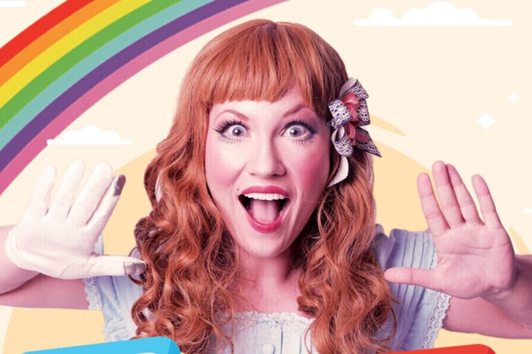 Adelaide Fringe performer, Meg in the Magic Toyshop dressed in a dolls outfit with a missing glove.