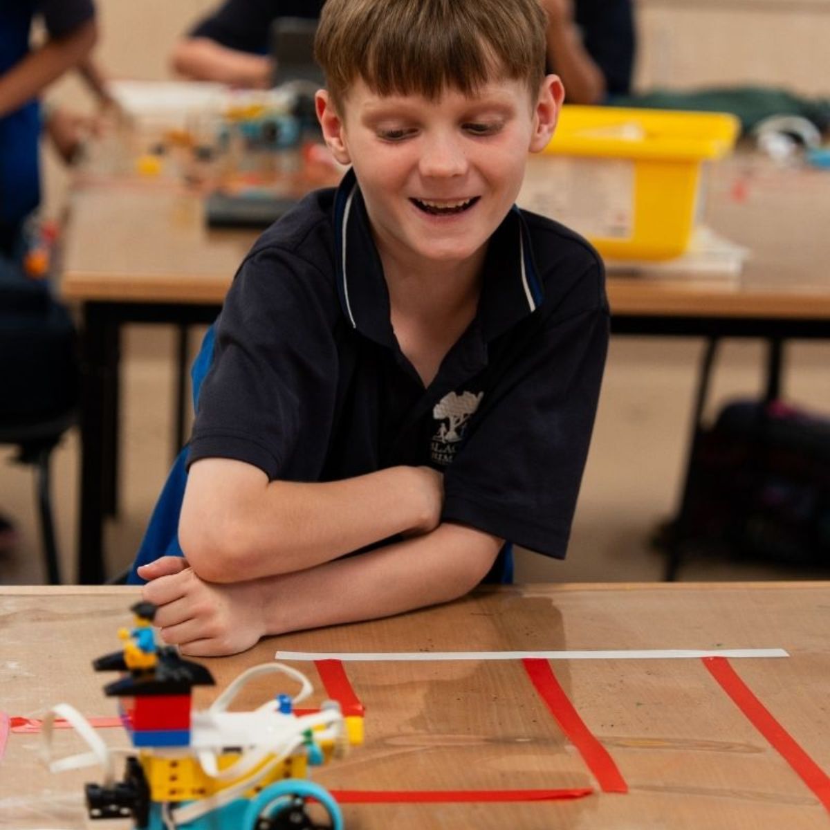 FUTURENEERS boy with electronic creation.