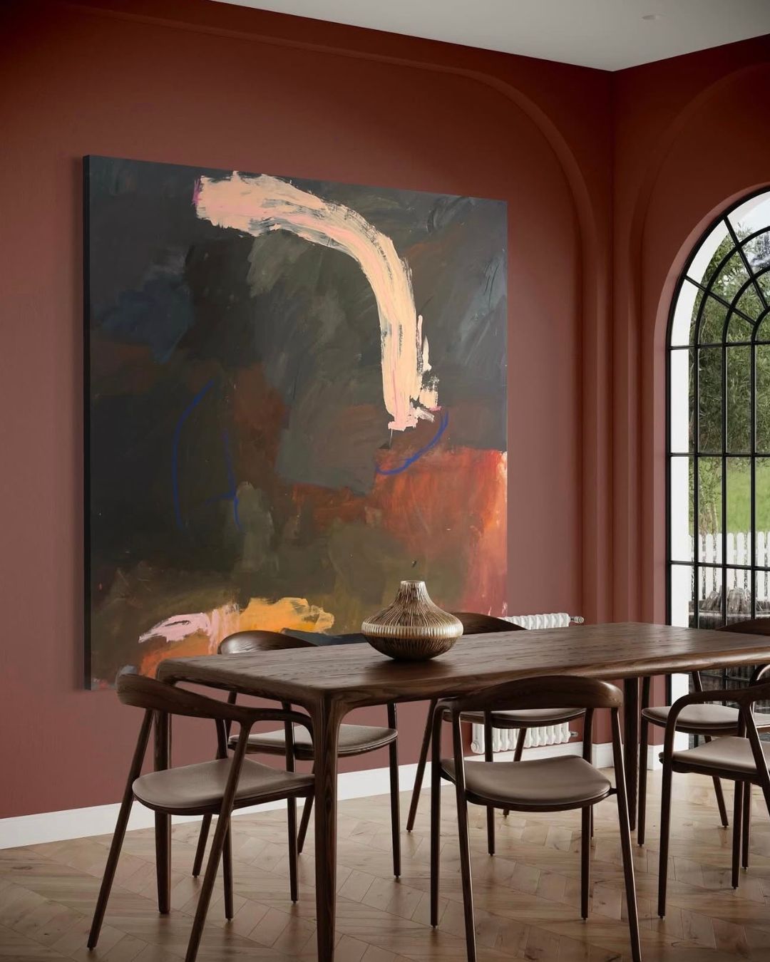 Art work by Madeleine Collopy hanging in a dining room.