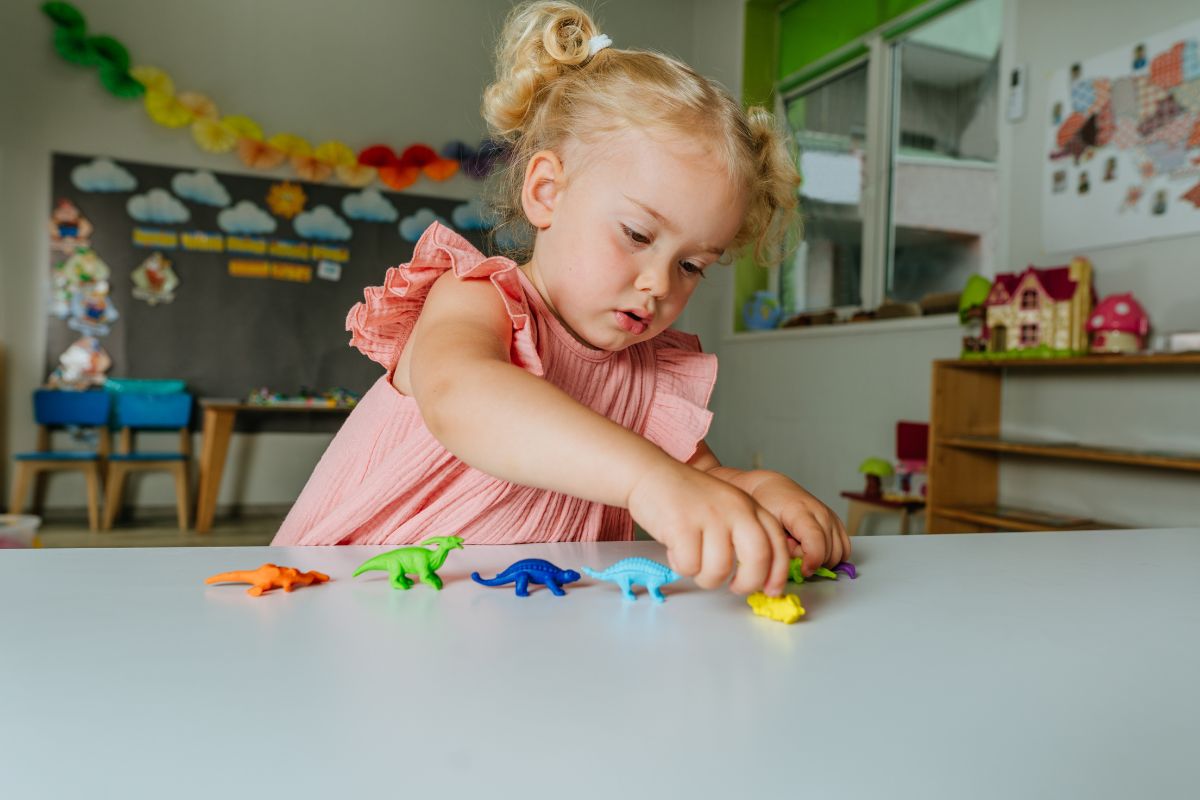 Tatachilla school student playing with toys in classroom.
