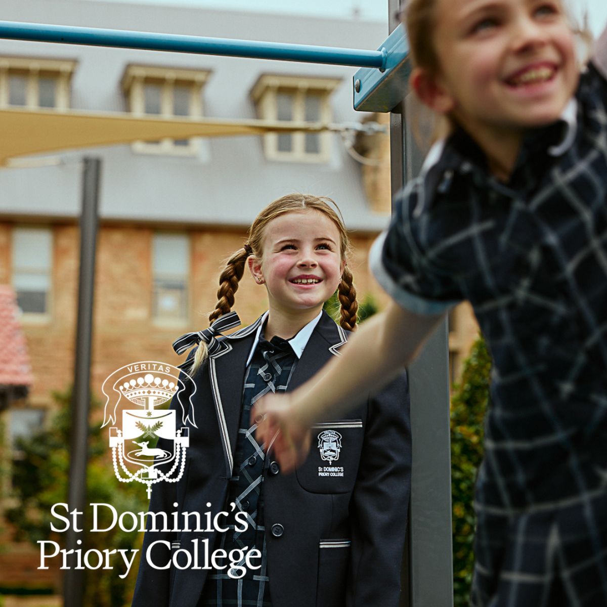 St Dominic's Priory College school girls in school uniform in their school playground.