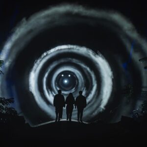 Illuminate Adelaide 2026 Night Visions. 3 people standing in front of round circles of light.