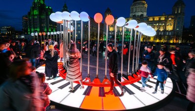Giant illuminated piano keys installation at night, Illuminate Adelaide