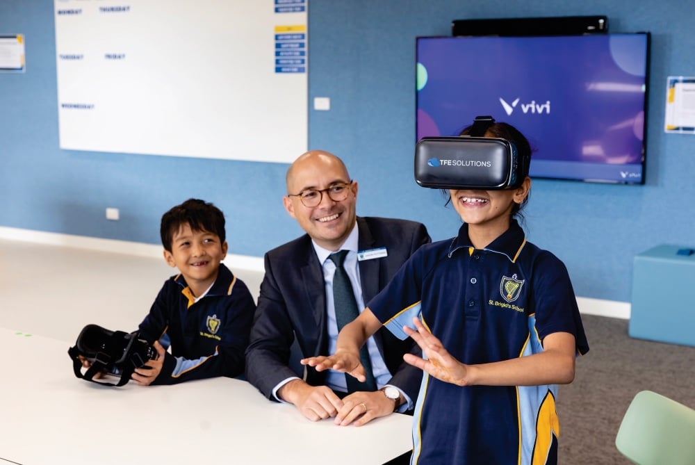 Students and teacher engaged in outdoor learning at a South Australian Catholic school