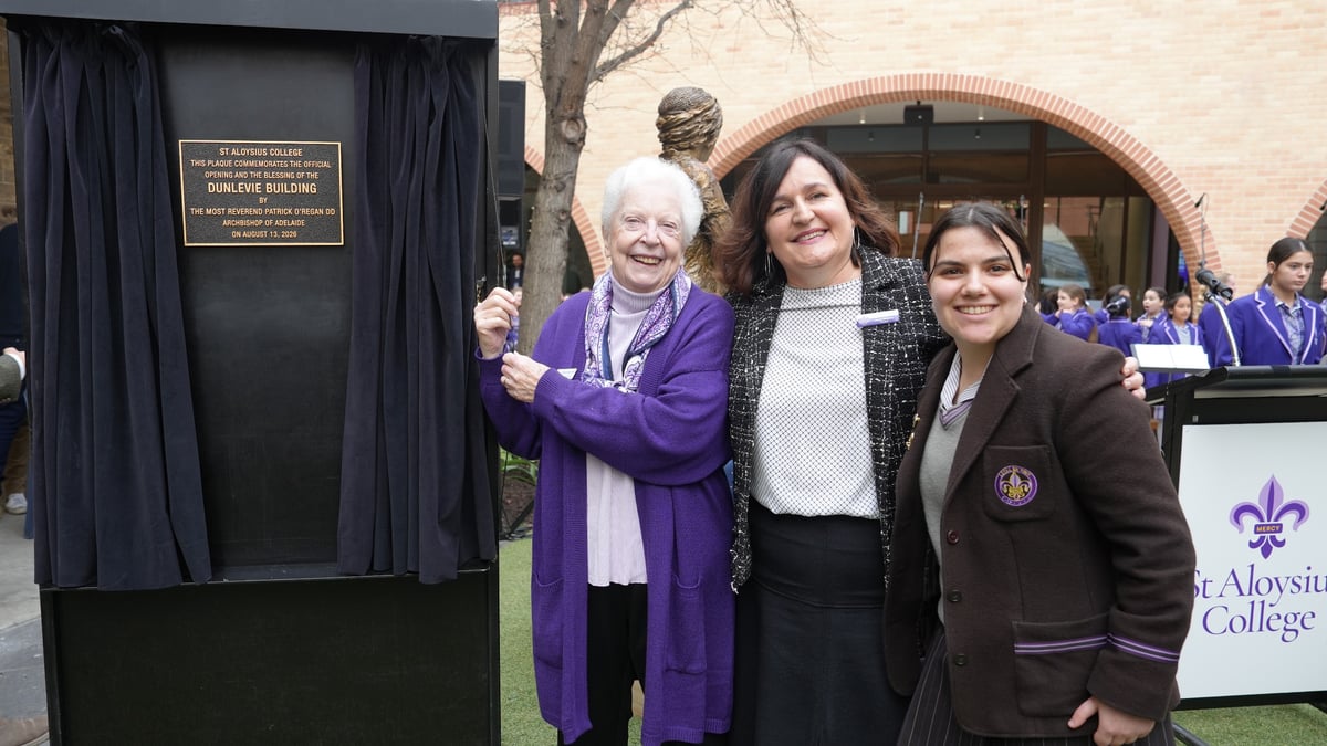 Former Principal Sr Judith Redden RSM, Principal Ms Paddy McEvoy and College Captain Liliana Bagnato unveiling the plaque at the Dunlevie Building opening