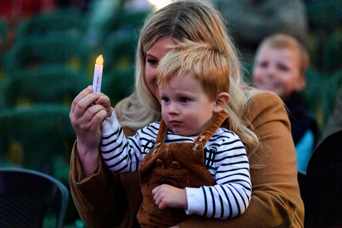 boy and Mum with candle